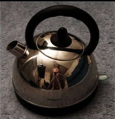 Leilão do ebay Uma chaleira de chá com reflexo pornô