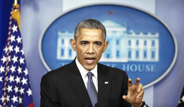 U.S. President Obama answers a question about the cyberattack on Sony Pictures after his end of the year press conference in the briefing room of the White House in Washington